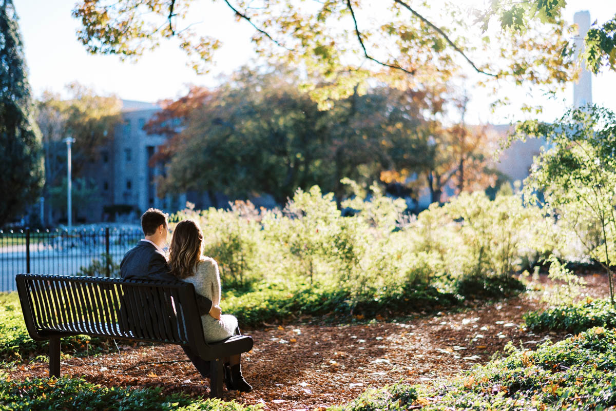 sitting on a bench, mcmaster university engagement session